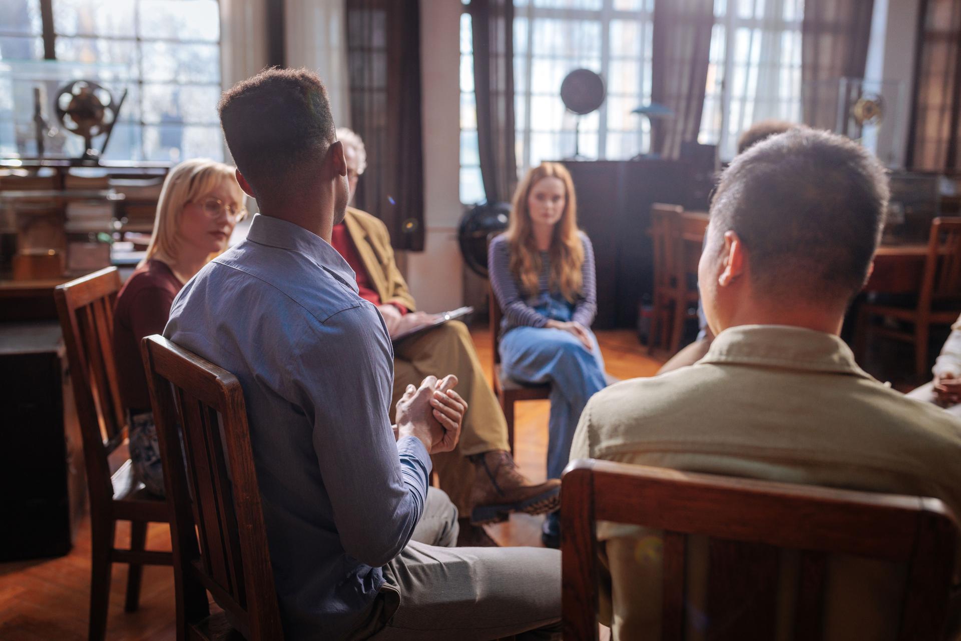 Mental health patients in group counseling.
